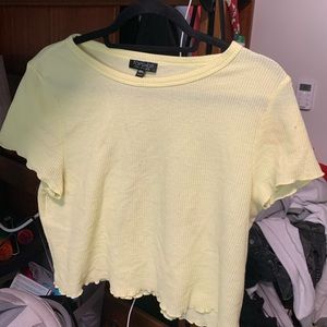 yellow cropped shirt